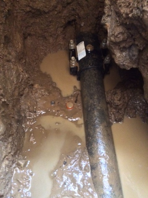 Water leak repairs to cast iron water pipe